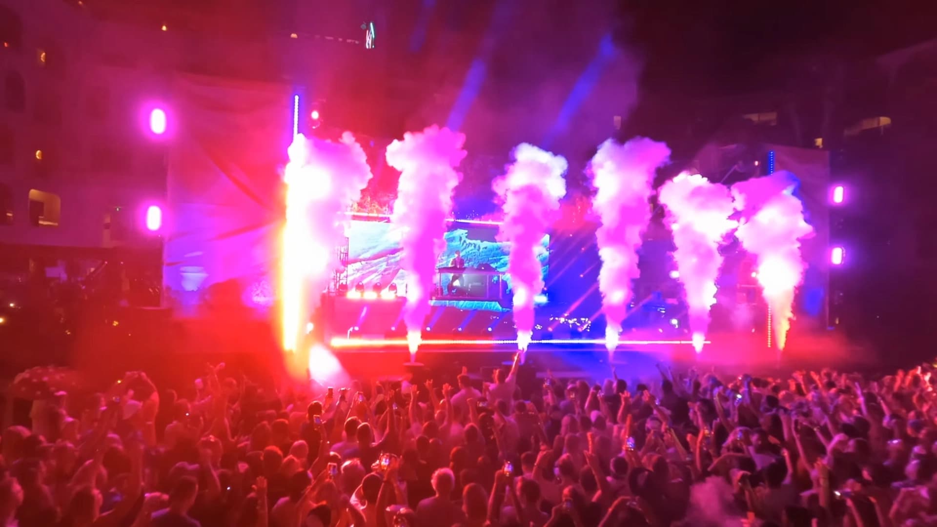 Sweeping crowd shots and large-scale atmospheric visuals that capture the energy and scale of music festivals, concerts, and public celebrations.